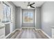 Cozy breakfast nook with a window seat and wood-look flooring at 15 Indian Woods Ne Dr, Rydal, GA 30171