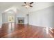 Spacious living room with hardwood floors, a fireplace and access to backyard at 15 Indian Woods Ne Dr, Rydal, GA 30171