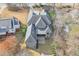 Aerial view of house highlighting its roofline and backyard at 2465 Henderson Rd, Tucker, GA 30084