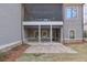 Spacious back patio with screened porch and paver stones at 2465 Henderson Rd, Tucker, GA 30084