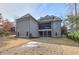 House exterior showcasing a screened porch and backyard at 2465 Henderson Rd, Tucker, GA 30084