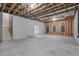 Unfinished basement with high ceilings and ample space at 2465 Henderson Rd, Tucker, GA 30084