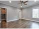 Spacious bedroom with hardwood floors and walk-in closet at 2465 Henderson Rd, Tucker, GA 30084