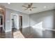 Spacious bedroom with hardwood floors and en-suite bathroom at 2465 Henderson Rd, Tucker, GA 30084