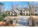 Brick house with gated entry and paved driveway at 2465 Henderson Rd, Tucker, GA 30084