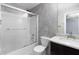 Updated bathroom with granite countertop and shower/tub combo at 1598 Blue Spruce Ln, Conyers, GA 30012