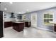 Modern kitchen with granite countertops and stainless steel appliances at 1598 Blue Spruce Ln, Conyers, GA 30012