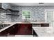 Modern kitchen with granite countertops and stainless steel appliances at 1598 Blue Spruce Ln, Conyers, GA 30012