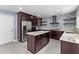 Modern kitchen with granite countertops and stainless steel appliances at 1598 Blue Spruce Ln, Conyers, GA 30012