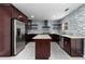 Modern kitchen with granite countertops and stainless steel appliances at 1598 Blue Spruce Ln, Conyers, GA 30012
