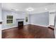 Living room features hardwood floors and a fireplace at 1598 Blue Spruce Ln, Conyers, GA 30012