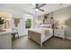 Cozy bedroom with a light-toned bed frame and window at 165 Poppy St, Mcdonough, GA 30253