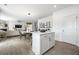 Open concept dining area with a view of the kitchen and living room at 165 Poppy St, Mcdonough, GA 30253