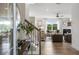 Bright and spacious entryway with hardwood floors and view of living room at 165 Poppy St, Mcdonough, GA 30253