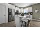 Island kitchen with stainless steel appliances and white cabinets at 165 Poppy St, Mcdonough, GA 30253