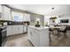 Open concept kitchen with island and breakfast bar at 165 Poppy St, Mcdonough, GA 30253