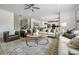 Open living room featuring modern furniture and a cozy atmosphere at 165 Poppy St, Mcdonough, GA 30253