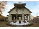 Relaxing outdoor space with a fire pit and Adirondack chairs at 29 Hydrangea Unit 72 Way, Auburn, GA 30011