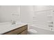 Clean bathroom with a tub, shower, and vanity at 305 Foxglove Way, Mcdonough, GA 30253