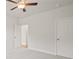 Spacious bedroom with ceiling fan and neutral decor at 305 Foxglove Way, Mcdonough, GA 30253