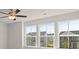 Bedroom with large windows and city view at 305 Foxglove Way, Mcdonough, GA 30253