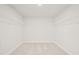 Spacious walk-in closet with wire shelving at 305 Foxglove Way, Mcdonough, GA 30253
