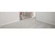Upper hallway with grey carpet and view to staircase at 305 Foxglove Way, Mcdonough, GA 30253