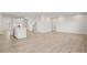 Open floor plan with kitchen, dining, and living areas at 305 Foxglove Way, Mcdonough, GA 30253