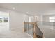 Upstairs hall with view to bedroom and stairs at 305 Foxglove Way, Mcdonough, GA 30253