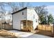 Modern two-story house with a deck and fenced yard at 40 Thayer Se Ave, Atlanta, GA 30315