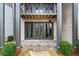 A flagstone patio with French doors leading to the house at 92 Sheridan Dr, Atlanta, GA 30305