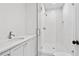 Clean bathroom with white subway tile shower and quartz countertop at 92 Sheridan Dr, Atlanta, GA 30305