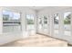 Bright bonus room with hardwood floors and access to a deck at 92 Sheridan Dr, Atlanta, GA 30305