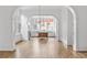 Spacious dining room with hardwood floors and arched entryways at 92 Sheridan Dr, Atlanta, GA 30305