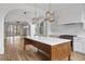 Open concept kitchen with island and hardwood floors at 92 Sheridan Dr, Atlanta, GA 30305