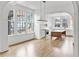 Bright kitchen with an island, white cabinets, and hardwood floors at 92 Sheridan Dr, Atlanta, GA 30305