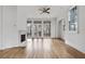 Living room with hardwood floors, fireplace, and French doors at 92 Sheridan Dr, Atlanta, GA 30305