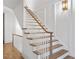 Elegant staircase with wood treads and white railings at 92 Sheridan Dr, Atlanta, GA 30305