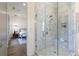 Bathroom with glass-enclosed shower and view of bedroom at 11610 Folia Cir, Alpharetta, GA 30005