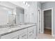 Elegant bathroom with double vanity and granite countertop at 316 Foxglove Way, Mcdonough, GA 30253