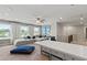 An upstairs living room offers plenty of seating and natural light at 316 Foxglove Way, Mcdonough, GA 30253