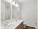 Modern bathroom with double vanity and glass shower at 457 Parkway Ne Dr, Atlanta, GA 30308