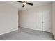 Bedroom with double doors to closet and grey carpeting at 457 Parkway Ne Dr, Atlanta, GA 30308