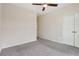 Spacious bedroom with double door closet and ceiling fan at 457 Parkway Ne Dr, Atlanta, GA 30308