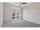 Bright bedroom with carpet and ceiling fan at 457 Parkway Ne Dr, Atlanta, GA 30308