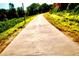 Concrete path of the BeltLine with green vegetation at 457 Parkway Ne Dr, Atlanta, GA 30308