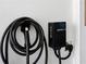 GrizzlE EV charger with a long power cord at 457 Parkway Ne Dr, Atlanta, GA 30308