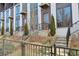 Modern townhome building with orange entry doors, landscaping, and black metal fence at 457 Parkway Ne Dr, Atlanta, GA 30308