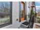 Modern townhouse with orange front door and black metal railings at 457 Parkway Ne Dr, Atlanta, GA 30308