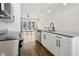Modern kitchen with white cabinets and stainless steel appliances at 457 Parkway Ne Dr, Atlanta, GA 30308